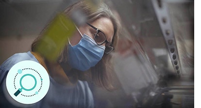 hospital staff in mask undertaking research