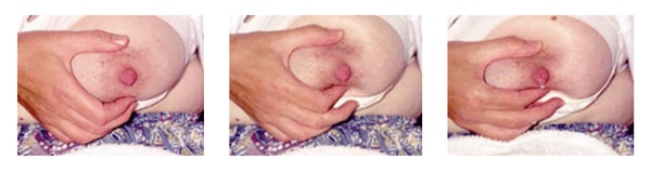 Hand expressing the breast