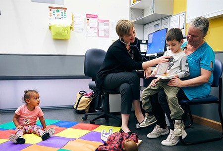 Doctor examining a child at Flinders Medical Centre