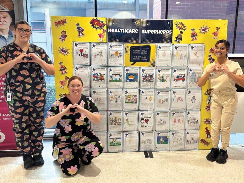 Children&rsquo;s Ward staff appreciating the school display