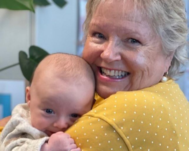 Nurse holding a baby